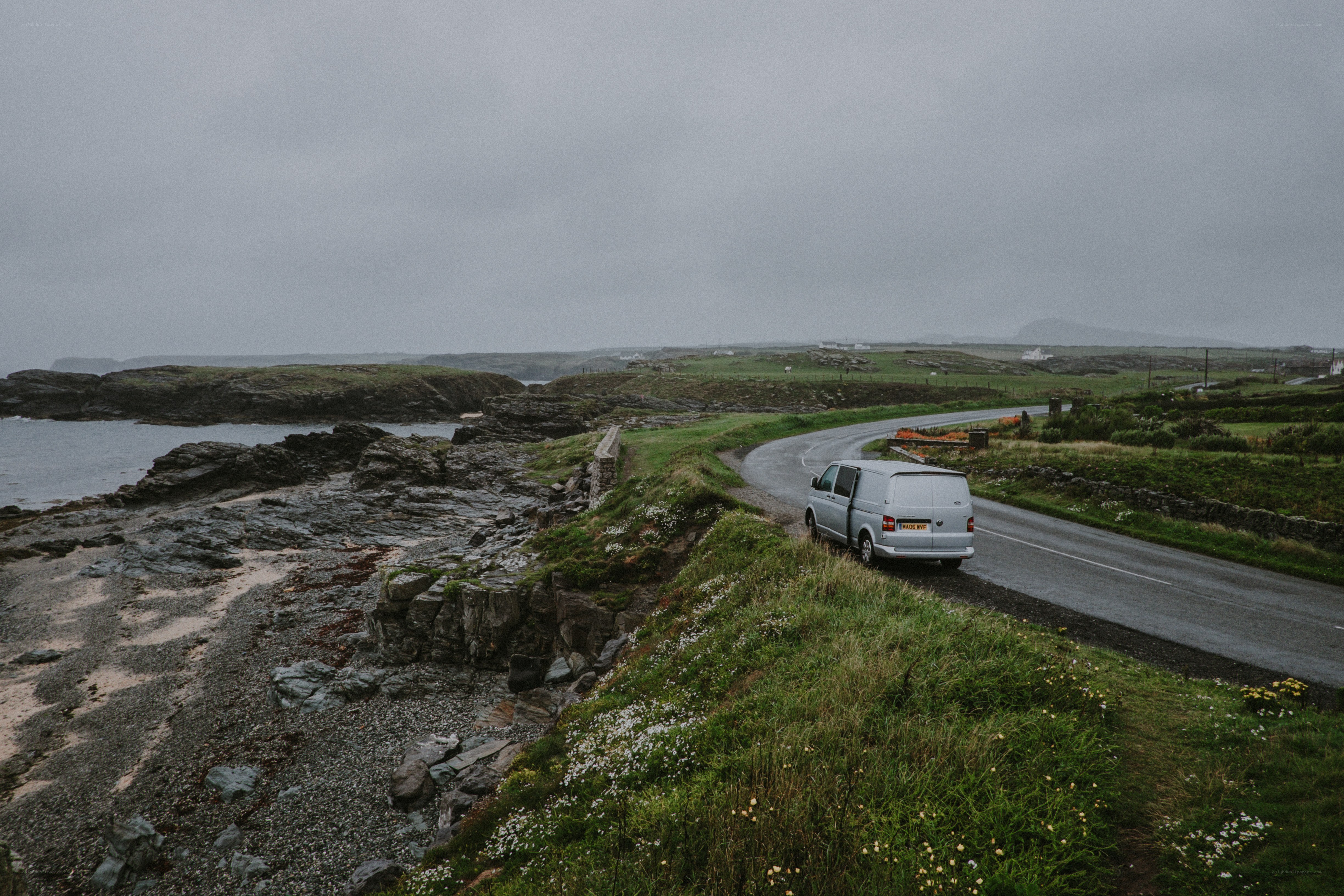 Van on coastal road