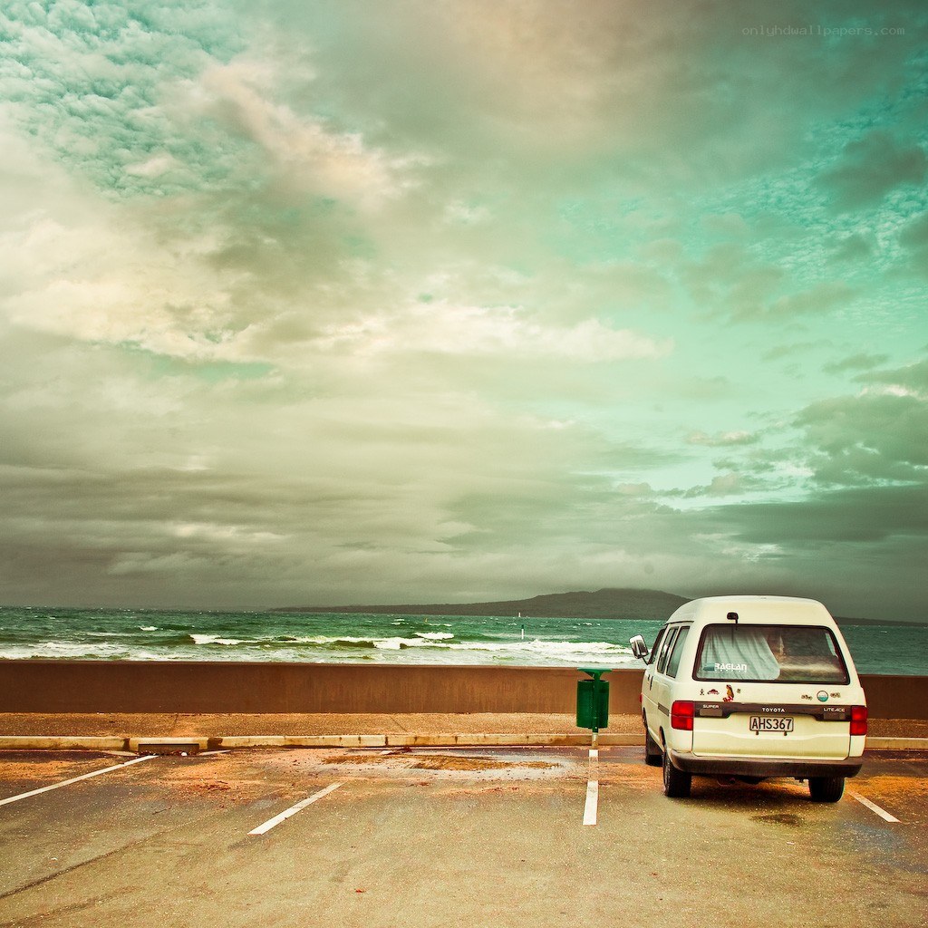 Van parked by the sea