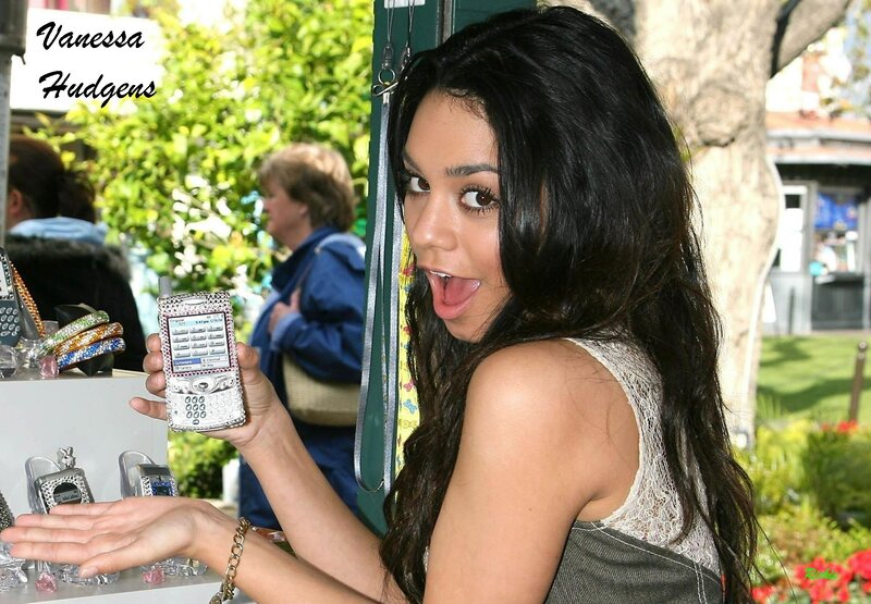 Vanessa Hudgens holding a phone