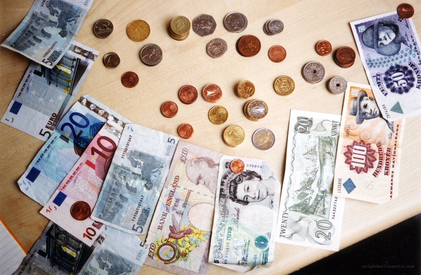 various international banknotes and coins