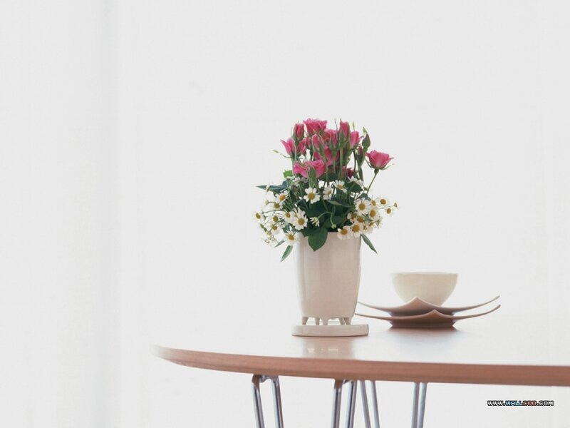 Vase of Flowers on Table — White