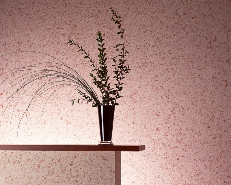 Vase with greenery on shelf