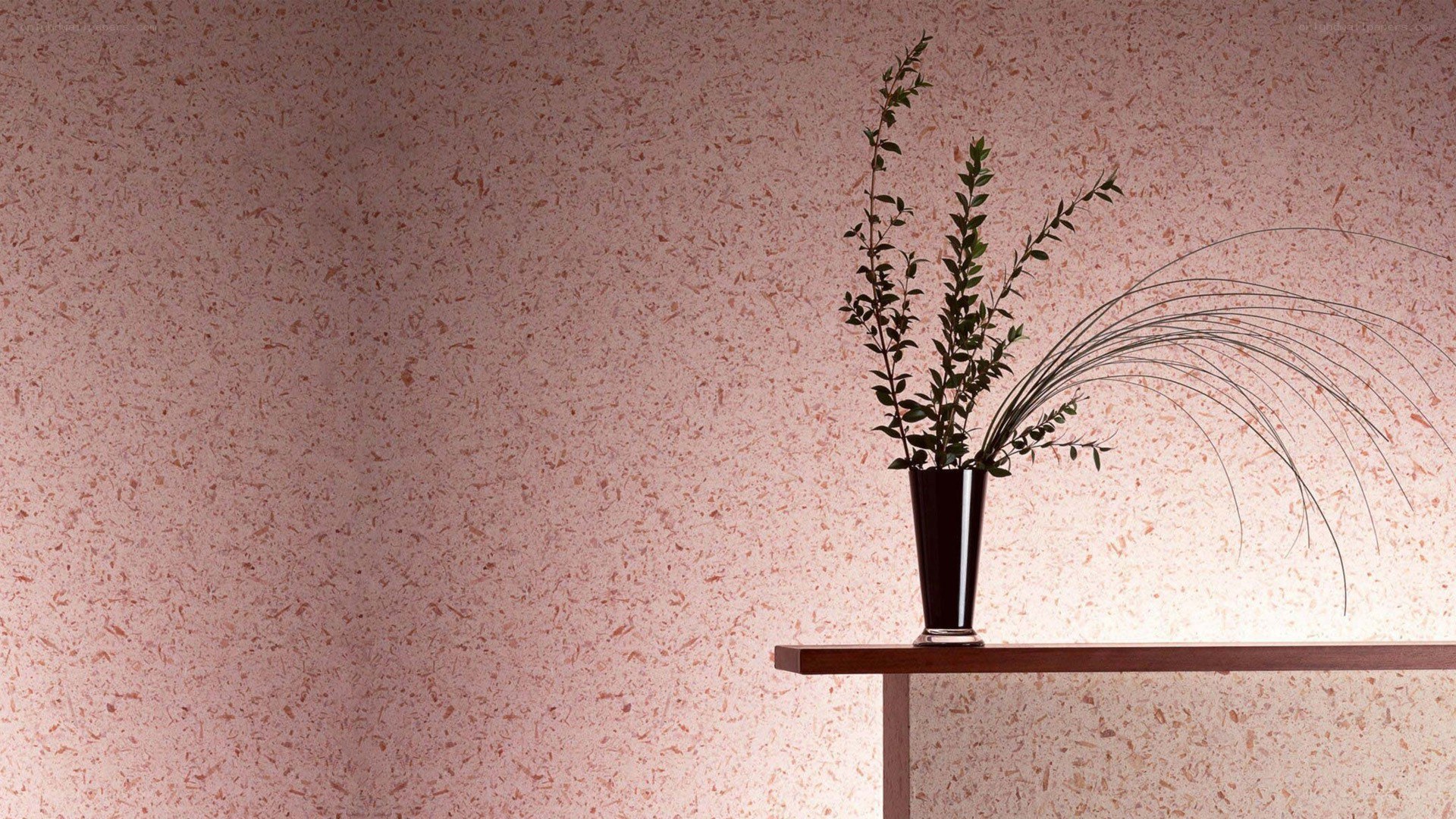 Vase with greenery on shelf