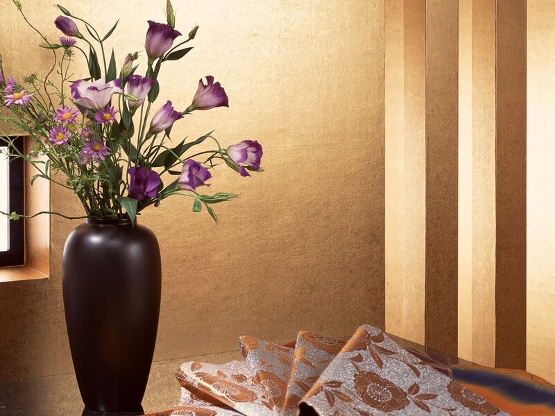 Vase with purple flowers