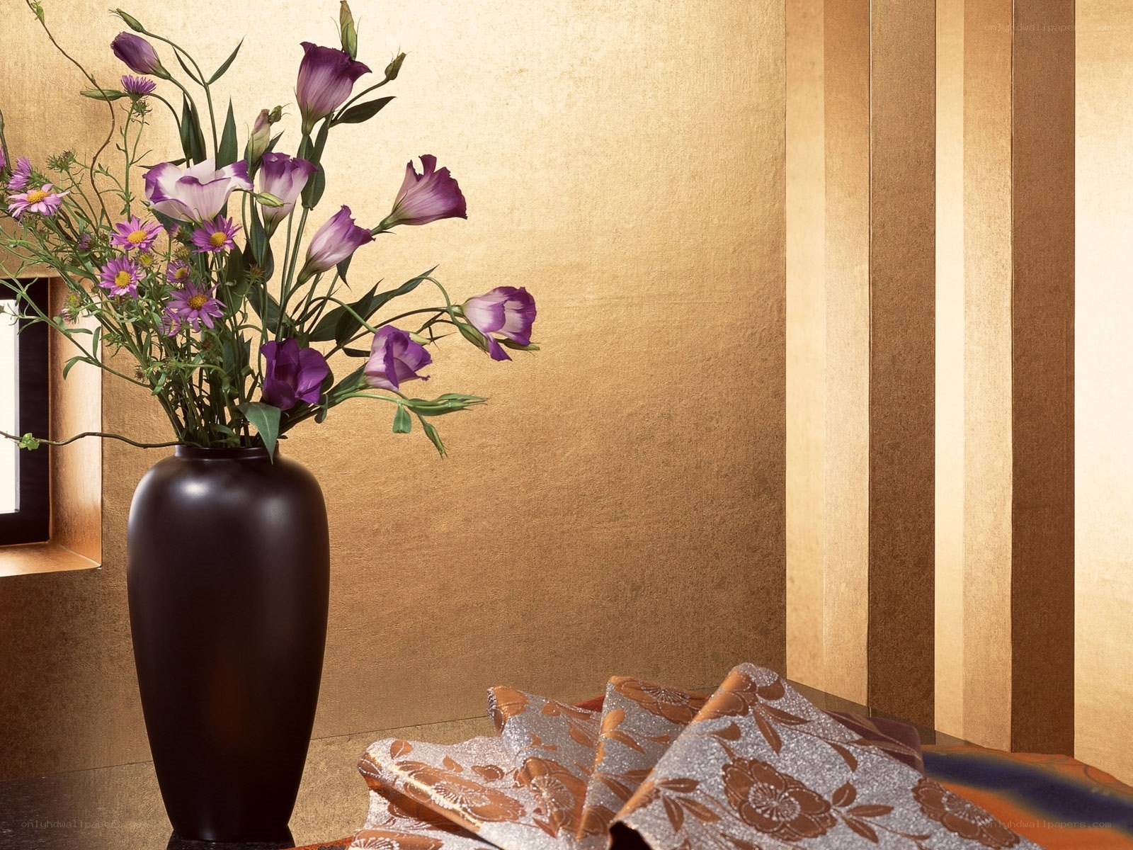 Vase with purple flowers