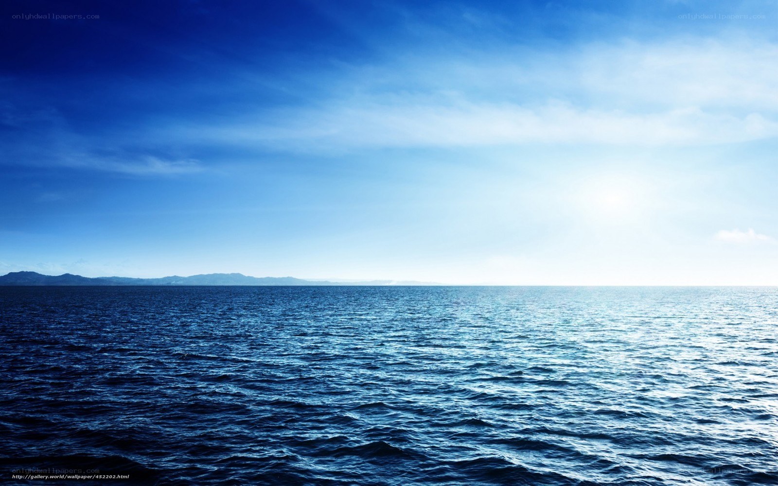 Vast ocean under blue sky