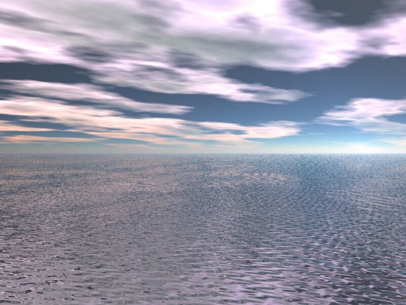 Vast ocean under cloudy sky