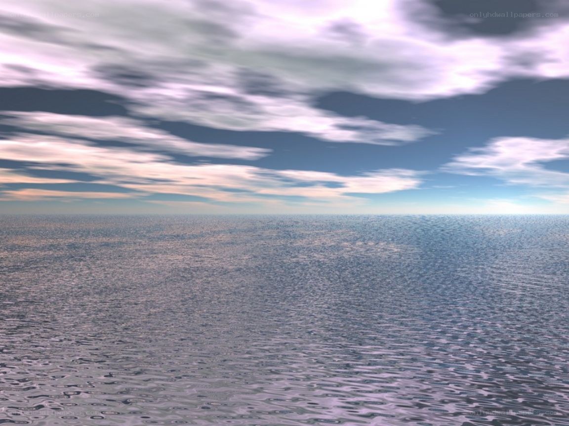 Vast ocean under cloudy sky