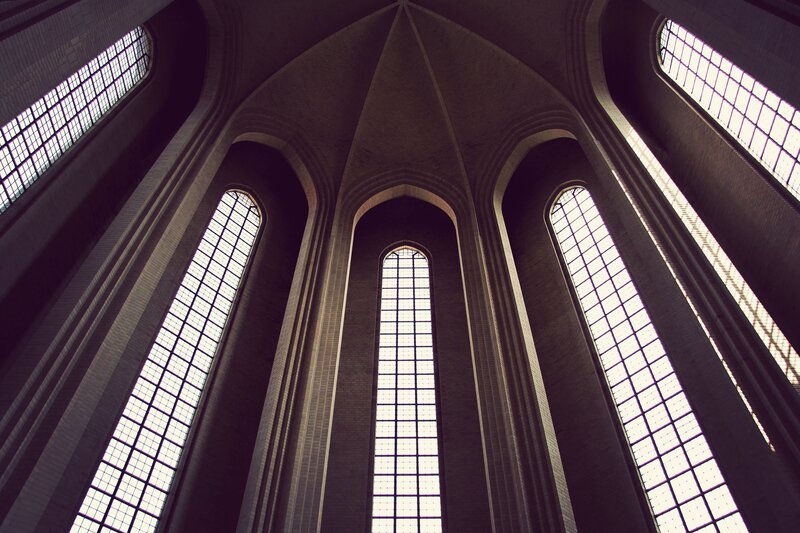 vaulted ceiling with stained glass