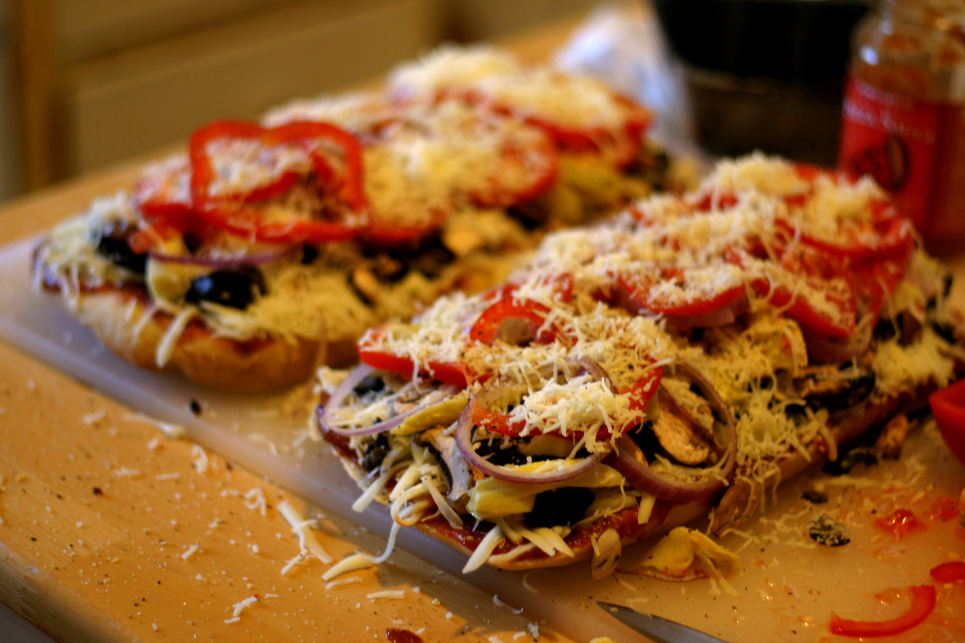 vegetable pizza on a cutting board