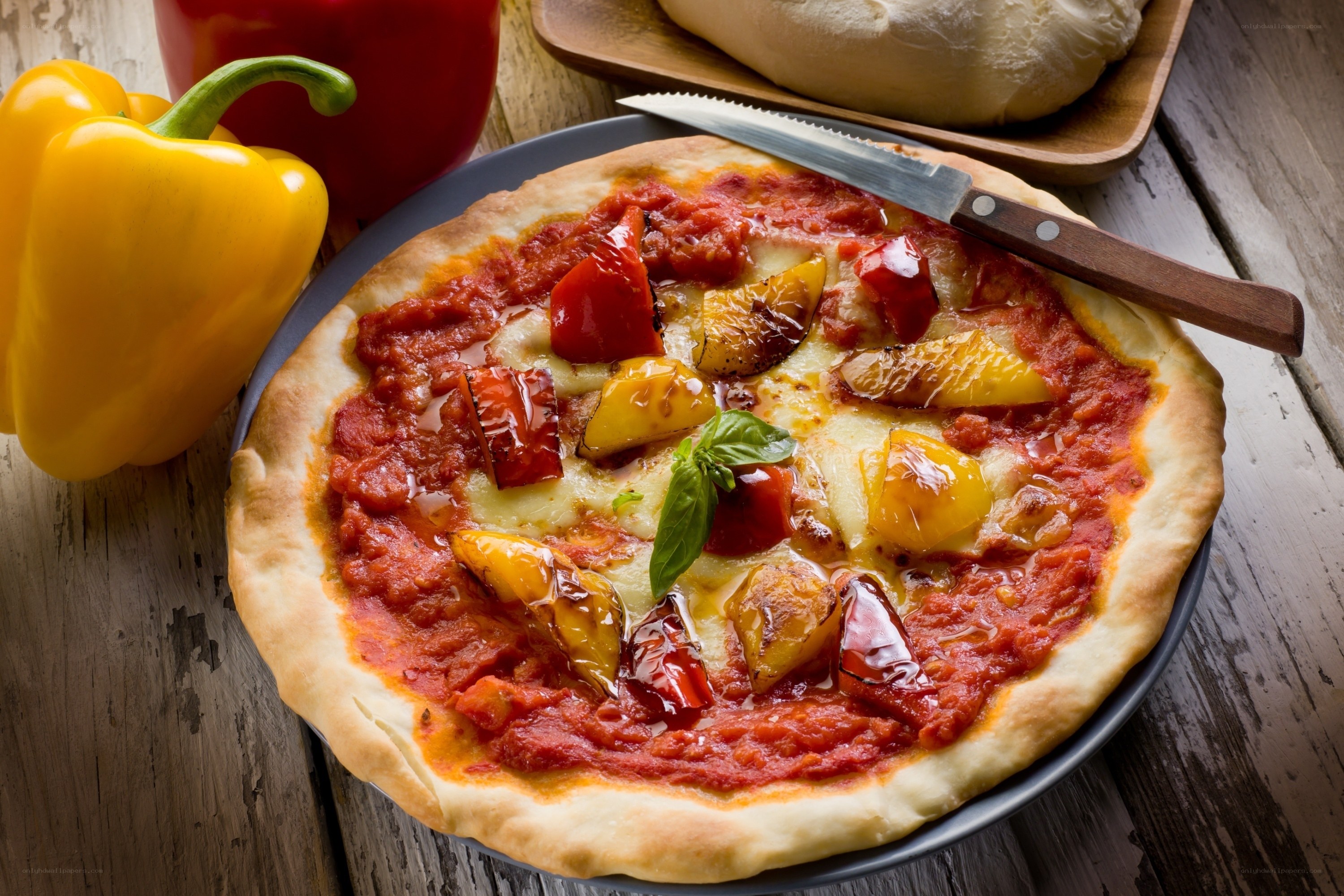 Vegetable pizza on wooden table