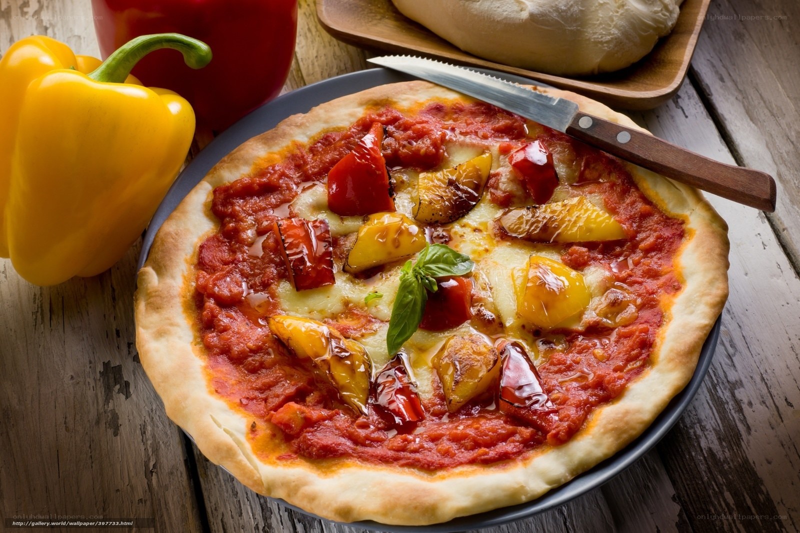 Vegetable pizza on wooden table