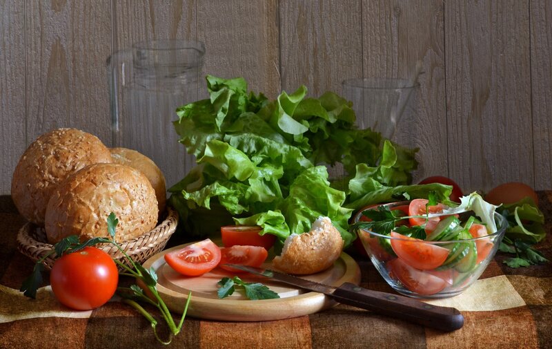 Vegetables and Bread on Table