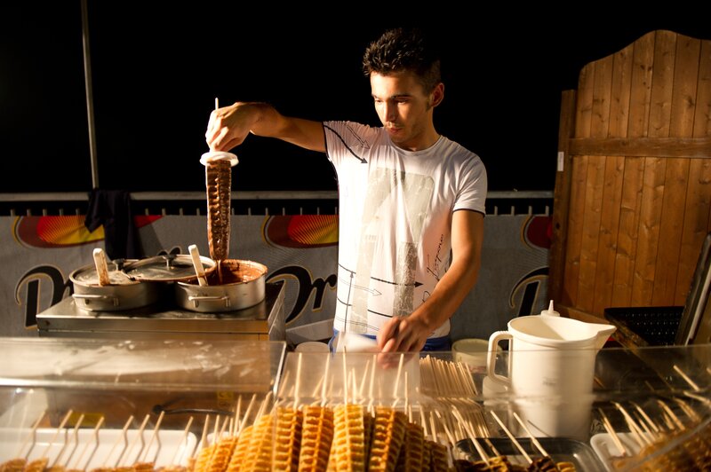 Vendor preparing chocolate waffles