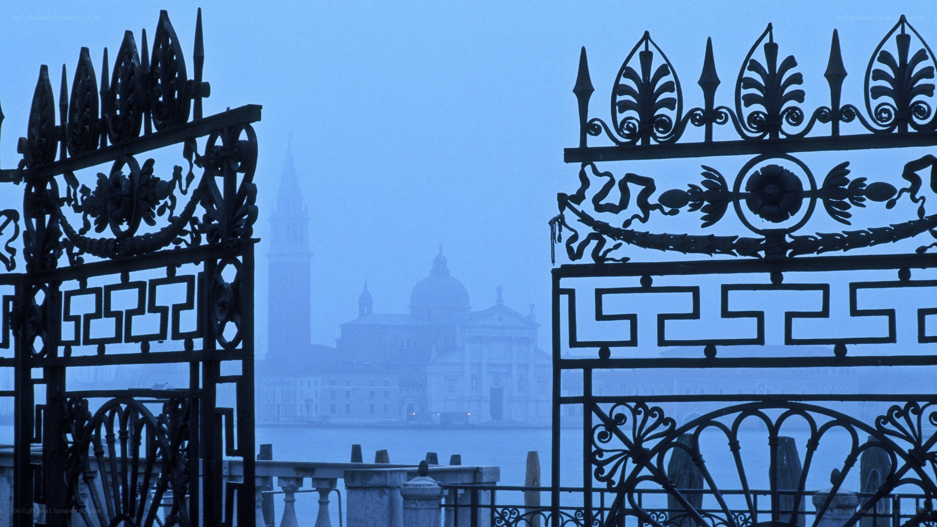 Venetian gate with city view