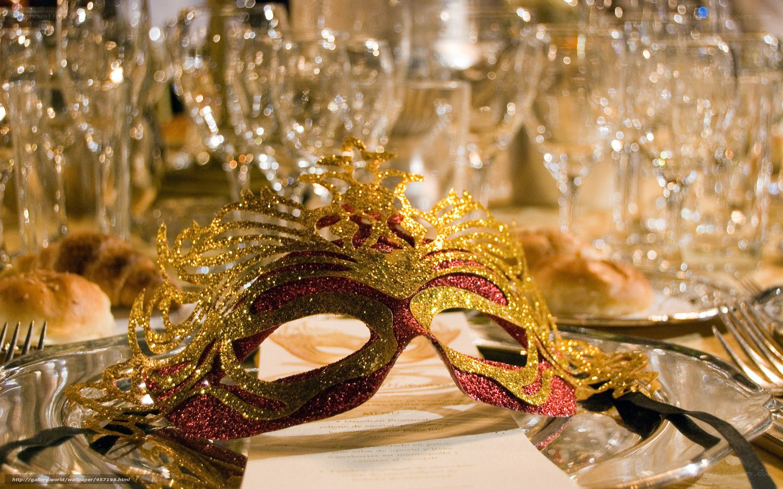 Venetian mask at dinner table