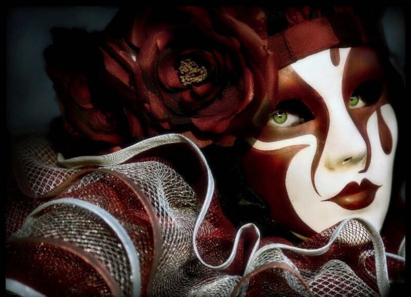 Venetian mask with red roses