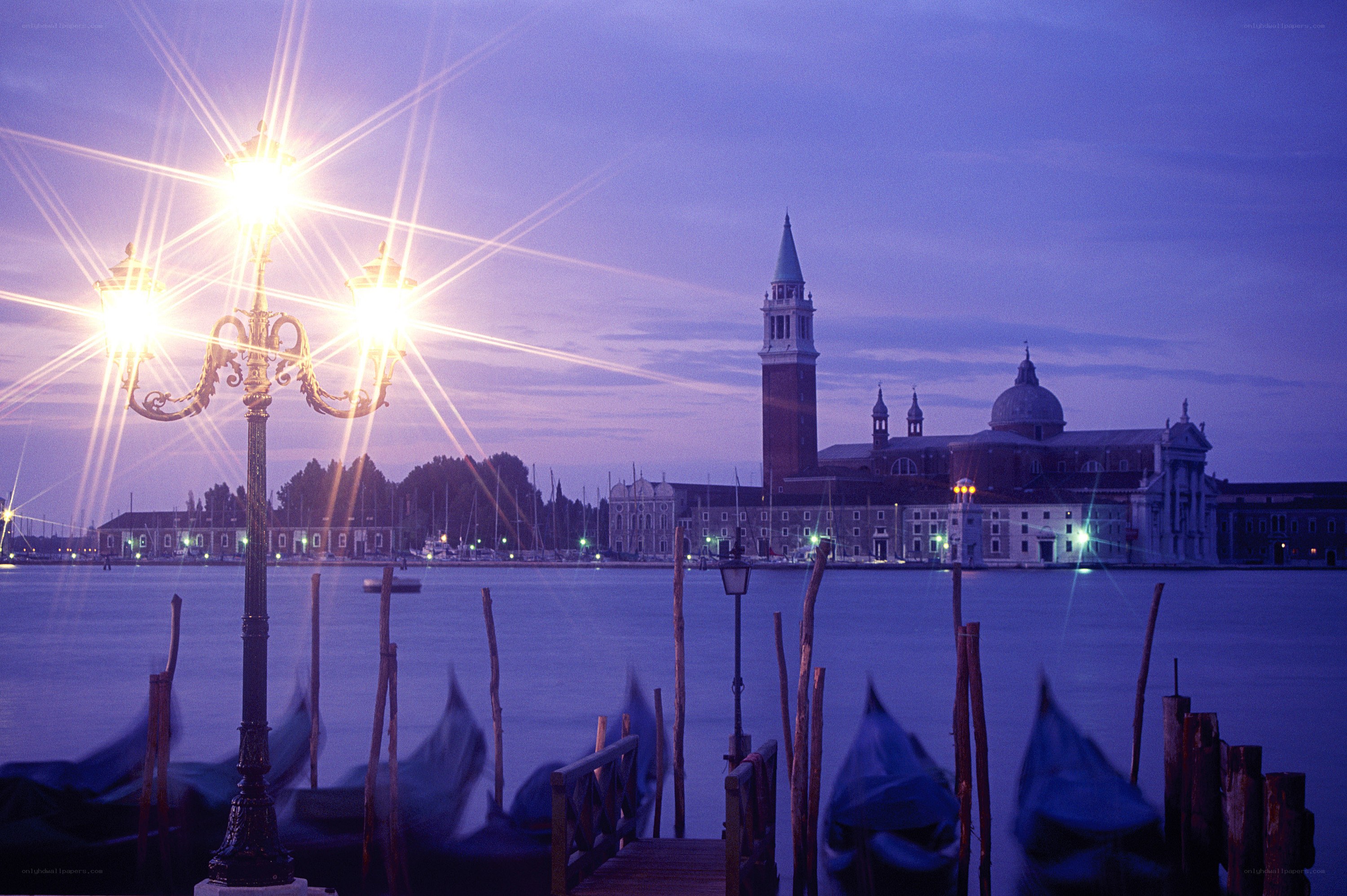 Venice at dusk with gondolas