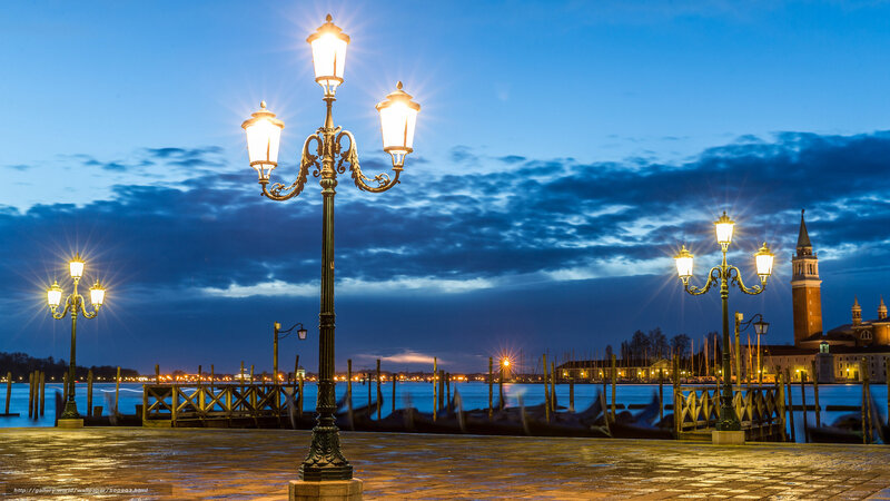 Venice at dusk with street lamps