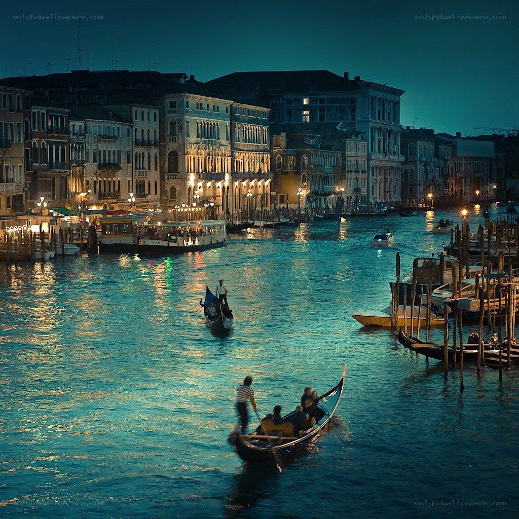 Venice at night with gondolas