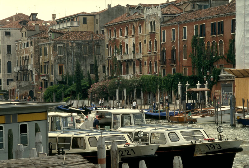 Venice canal with boats and buildings
