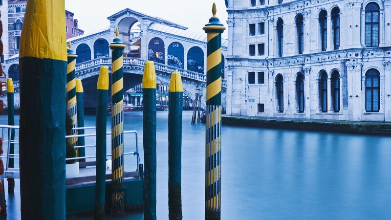 Venice canal with Rialto Bridge