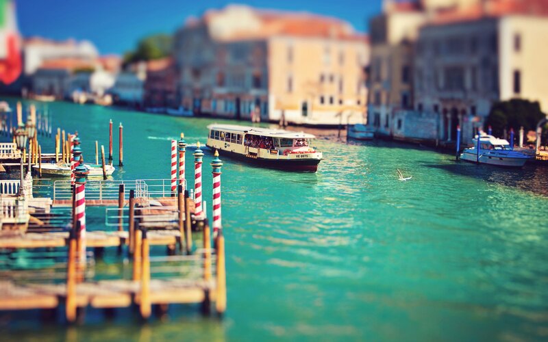 Venice canal with water taxi