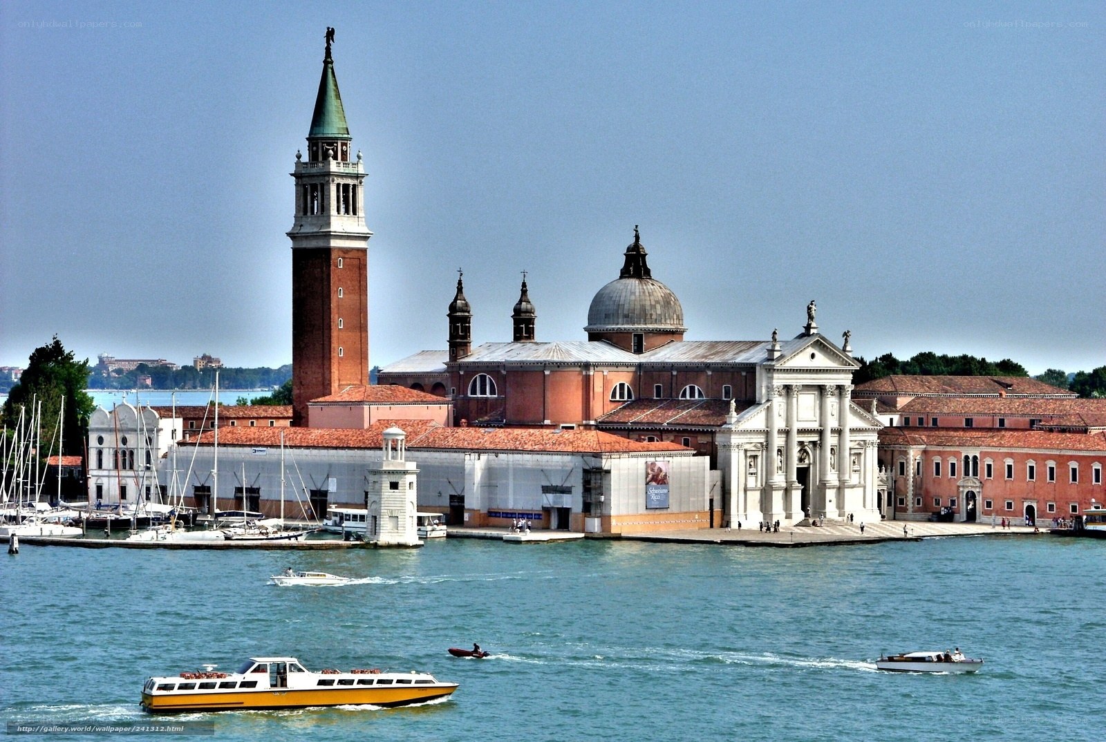 Venice island with church and boats