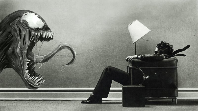 Venom confronts a man in a chair