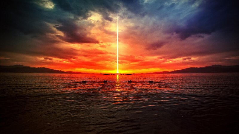 Vertical Light Beam over Water — Red