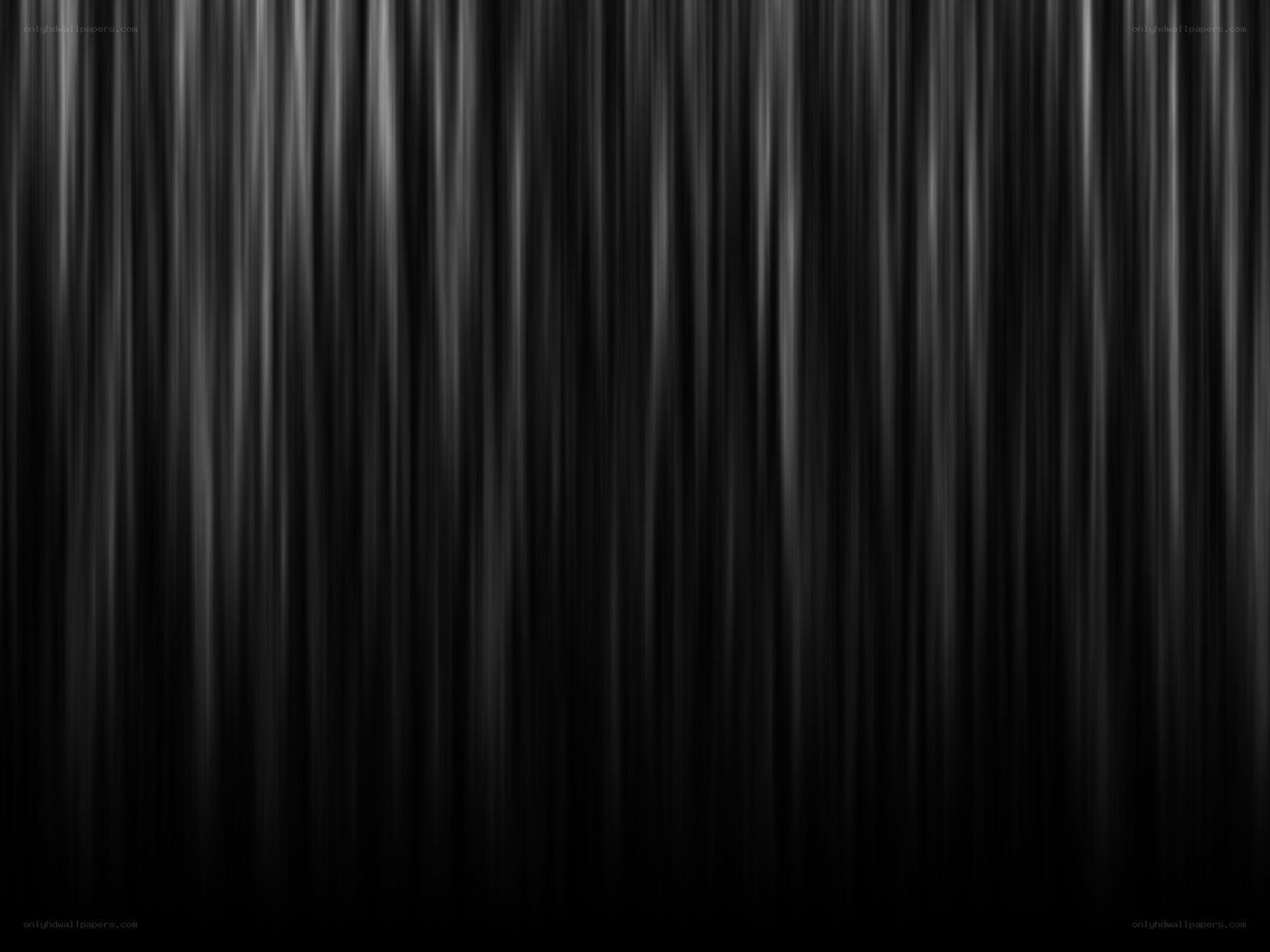vertical light streaks on black