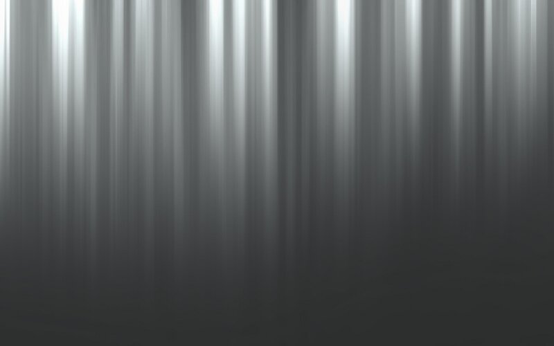 vertical light streaks on dark background