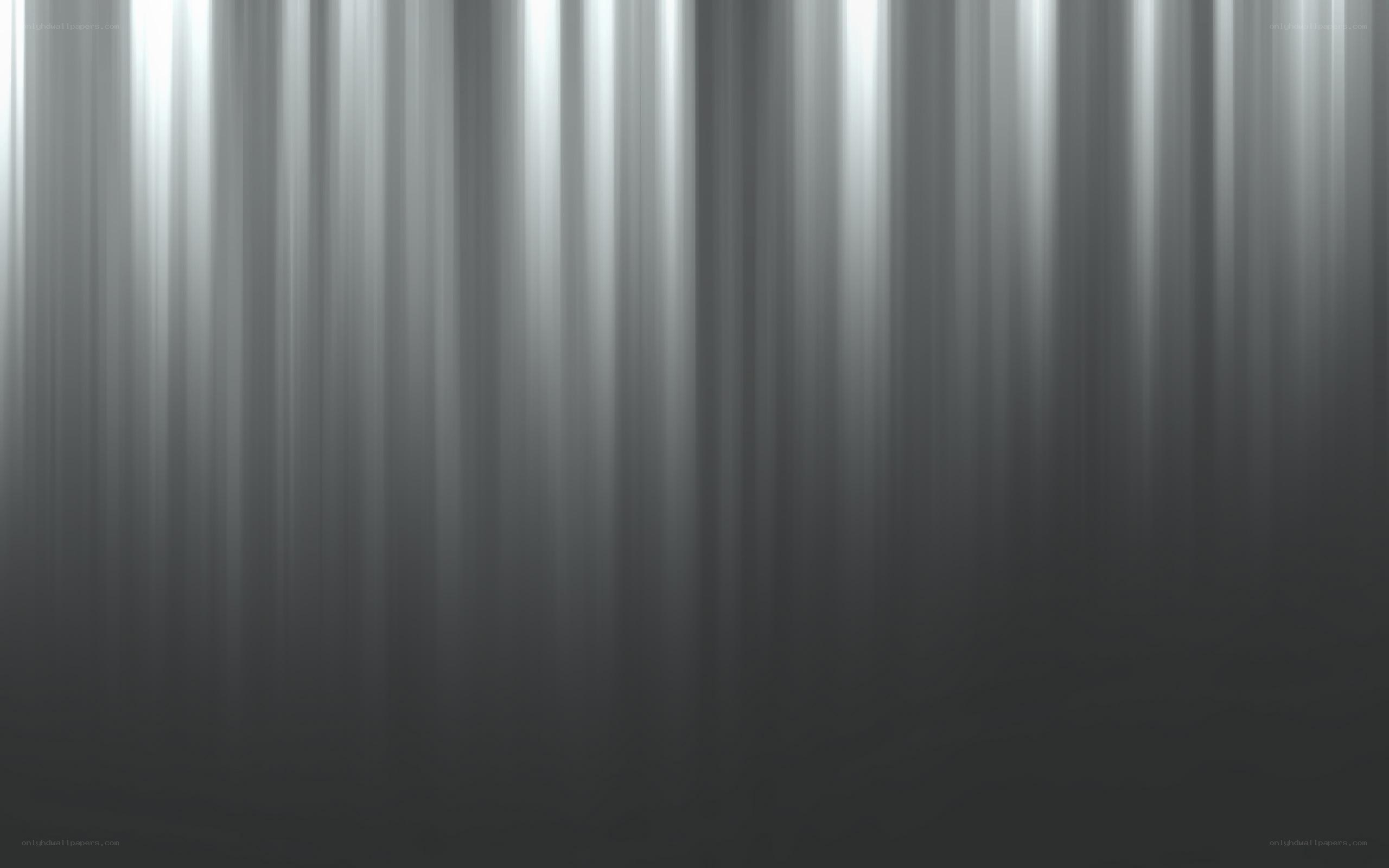 vertical light streaks on dark background