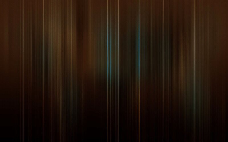 vertical light streaks on dark background