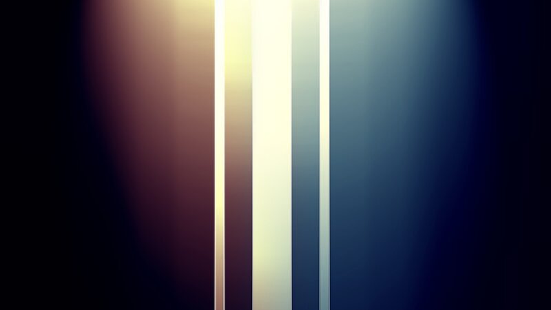 vertical light streaks on dark background
