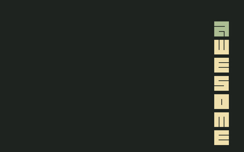 vertical text logo on dark background