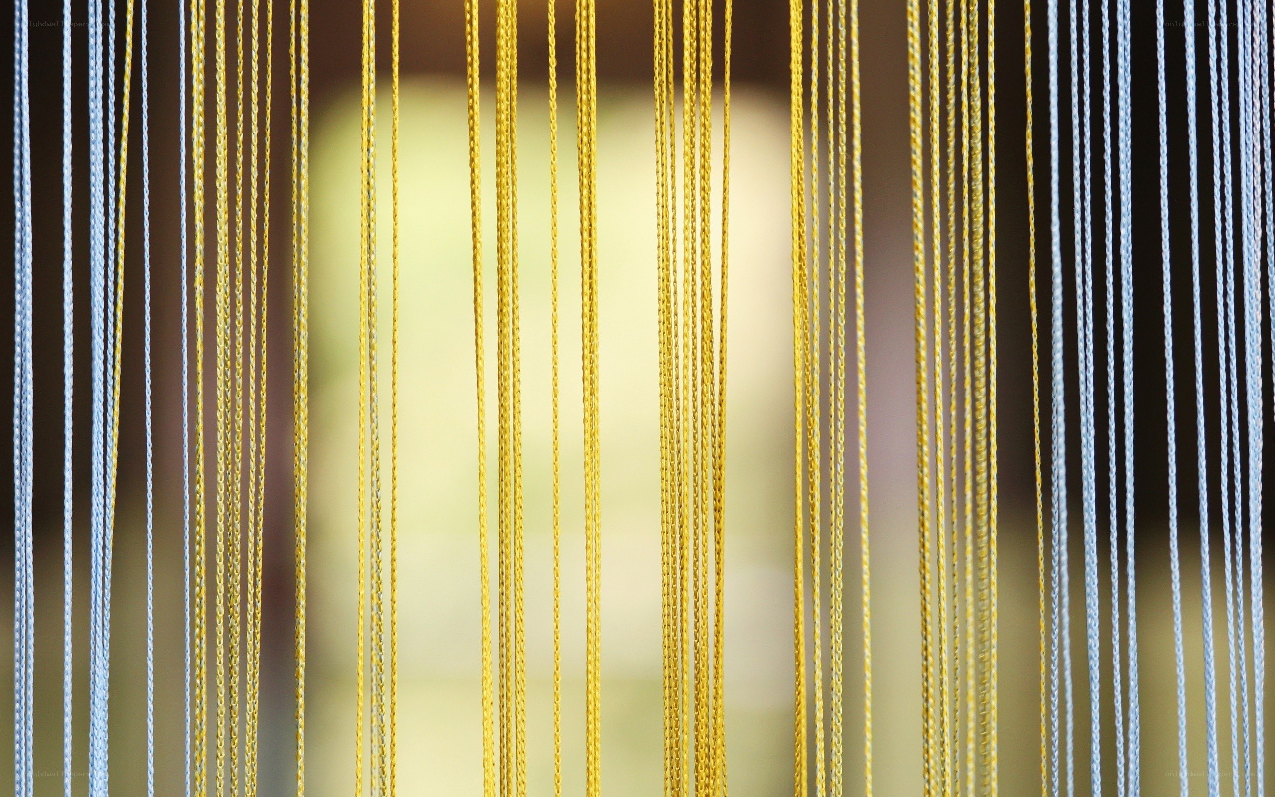 Vertical yellow and blue strings