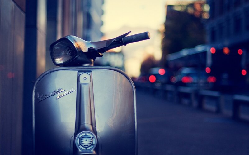Vespa scooter on city street