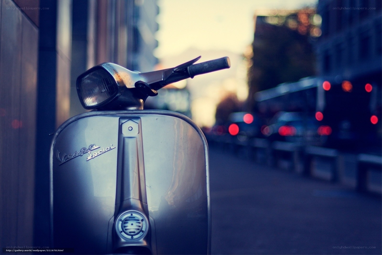 Vespa scooter on city street