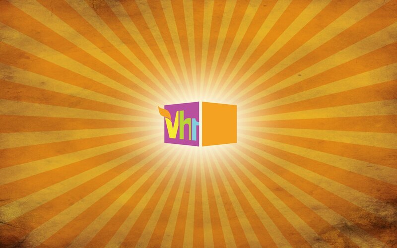 VH1 logo on sunburst background