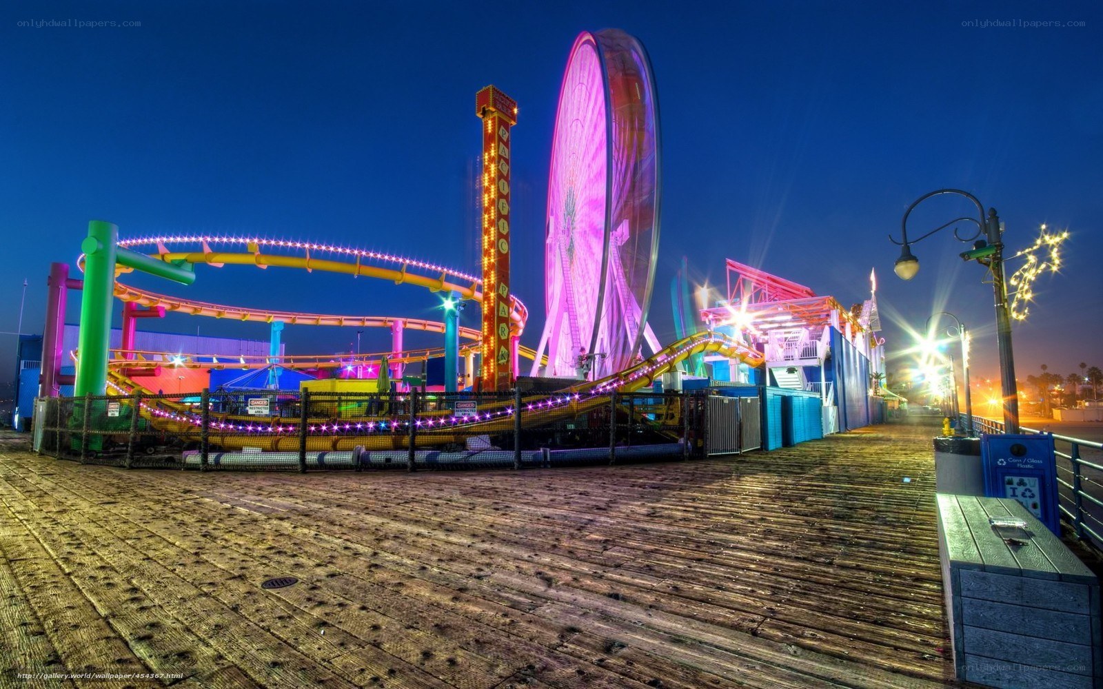 Vibrant amusement park at night