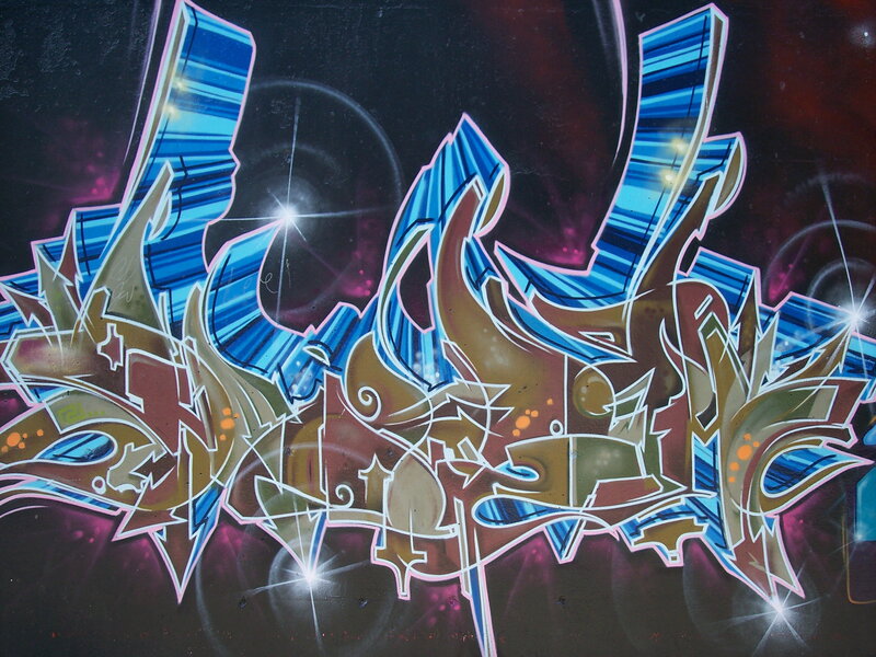 Vibrant blue and gold graffiti art