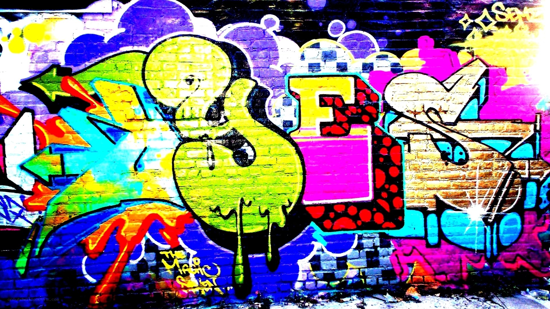 vibrant graffiti art on brick wall