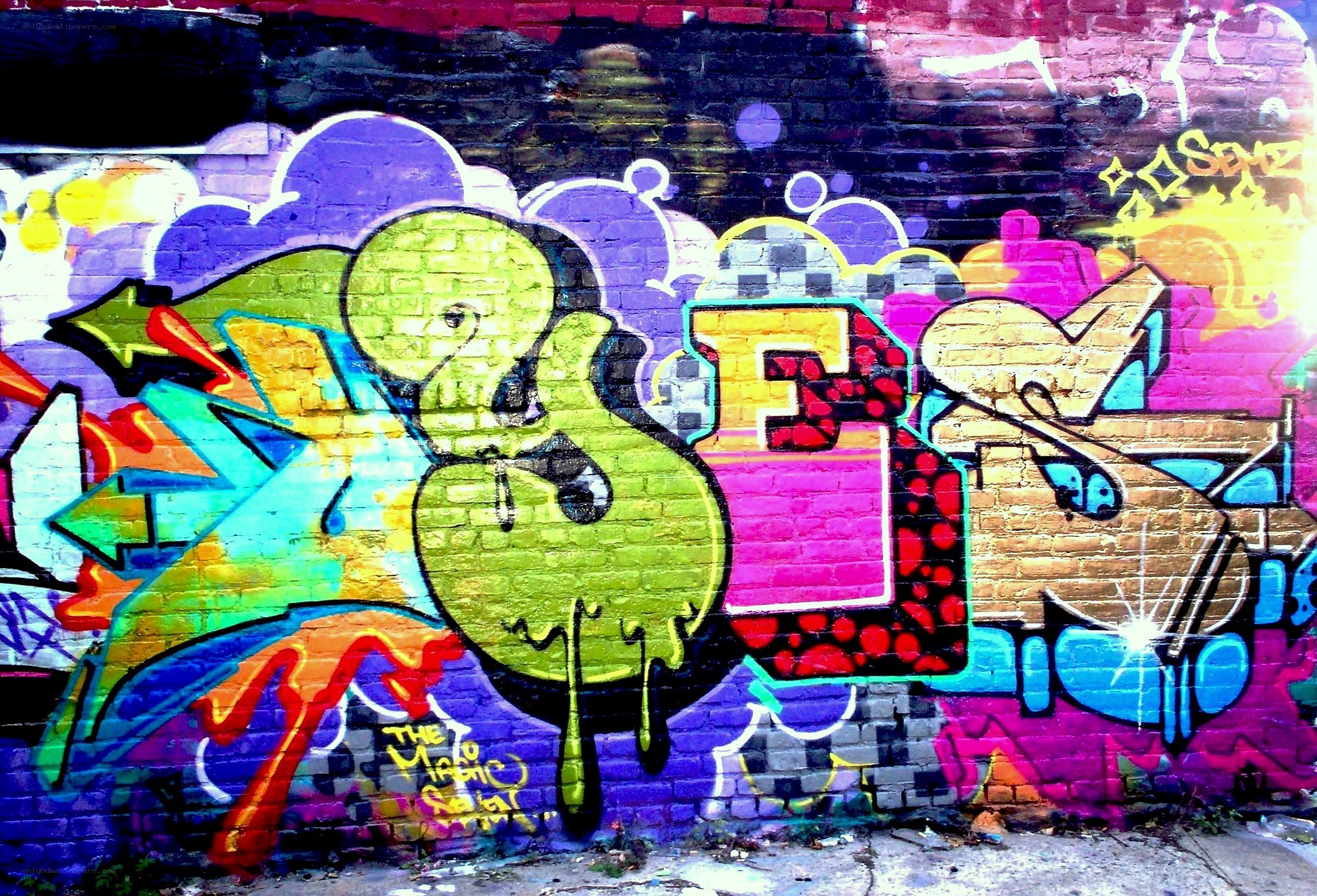 vibrant graffiti on brick wall