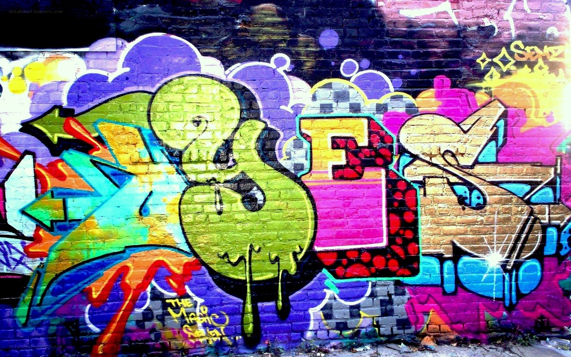 vibrant graffiti on brick wall