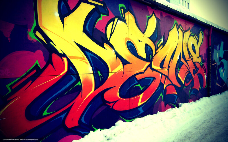 vibrant graffiti on snowy wall