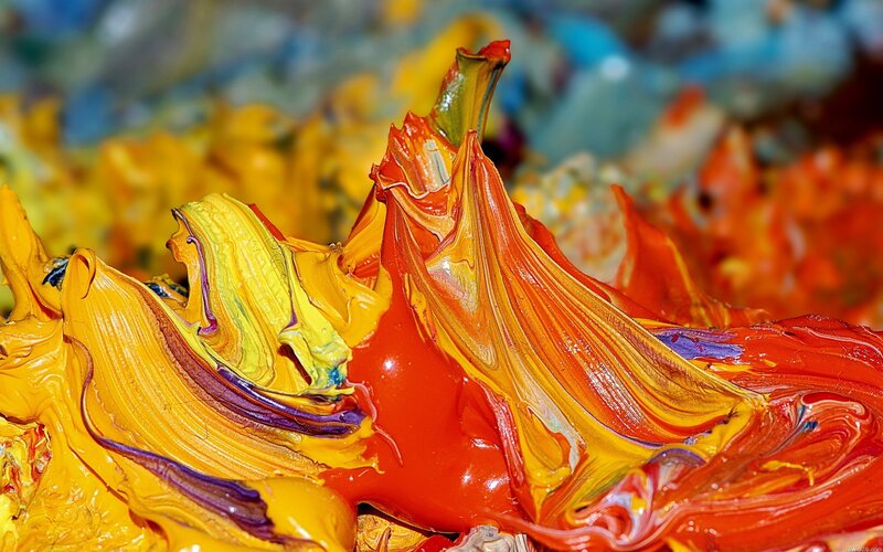 vibrant paint swirls on palette