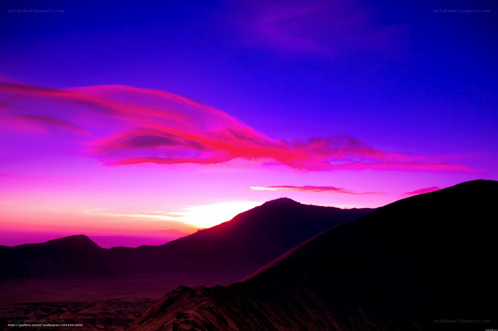 Vibrant purple sunset over mountains