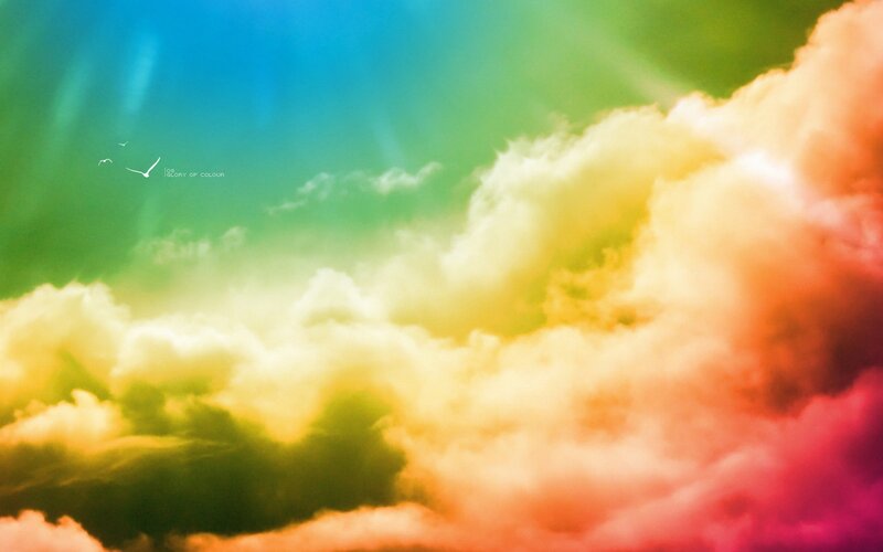 vibrant rainbow sky with clouds