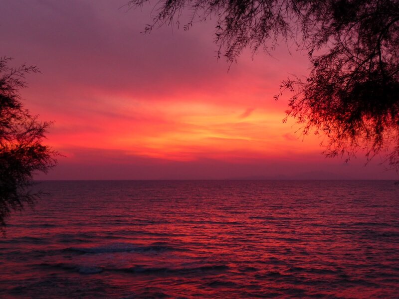 vibrant red sunset over sea
